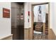 View of stainless steel elevator with adjacent chairs and staircase in entry at 396 Pratt Se Dr # 1932, Atlanta, GA 30315