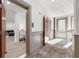 Hallway with neutral tones and stylish flooring, providing access to various living spaces and modern amenities at 396 Pratt Se Dr # 1932, Atlanta, GA 30315