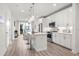 Modern kitchen with white cabinets, island, and stainless steel appliances at 396 Pratt Se Dr # 1932, Atlanta, GA 30315