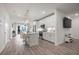 Open-concept kitchen with a central island, bar seating, and modern appliances, ideal for cooking and socializing at 396 Pratt Se Dr # 1932, Atlanta, GA 30315