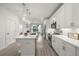 Modern kitchen with white cabinets, stainless steel appliances, and an island at 396 Pratt Se Dr # 1932, Atlanta, GA 30315