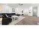 Airy living room design with a large gray sofa, stylish decor, and plenty of space for relaxation and entertaining at 396 Pratt Se Dr # 1932, Atlanta, GA 30315