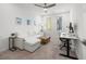 Cozy living room featuring a comfortable white sofa, stylish decor, and a ceiling fan for added comfort at 396 Pratt Se Dr # 1932, Atlanta, GA 30315