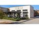 Exterior view of Patria Cocina restaurant with modern architecture and outdoor dining area at 396 Pratt Se Dr # 1932, Atlanta, GA 30315