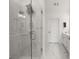 Modern bathroom featuring tiled shower, glass doors and rainfall shower head at 396 Pratt Se Dr # 1932, Atlanta, GA 30315