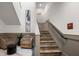 Modern staircase with stylish handrail and neutral tones at 396 Pratt Se Dr # 1932, Atlanta, GA 30315