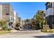 Street view of a residential community with modern townhomes and well-maintained landscaping under a clear blue sky at 396 Pratt Se Dr # 1932, Atlanta, GA 30315