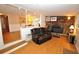 Relaxing living room with a stone fireplace and leather recliner at 4038 Wesley Chapel Rd, Marietta, GA 30062