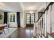 Bright entryway featuring double doors and hardwood floors at 1476 N Highland Ne Ave, Atlanta, GA 30306