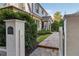 Stone walkway leading to front entrance with white pillars at 1476 N Highland Ne Ave, Atlanta, GA 30306