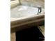 Bathroom features a soaking tub with a modern black faucet at 232 Spalding Drive Dr, Atlanta, GA 30328