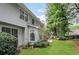 Charming two-story home with well-maintained lawn and landscaping at 232 Spalding Drive Dr, Atlanta, GA 30328