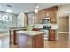 Updated kitchen with granite countertops and wood cabinets at 232 Spalding Drive Dr, Atlanta, GA 30328