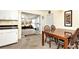 Dining area with wood table and chairs, adjacent to the kitchen at 3880 Admiral Dr, Atlanta, GA 30341