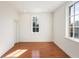 Bright bedroom with hardwood floors and large windows at 4231 Whitestone Pl, Atlanta, GA 30327