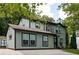 Two-story house with gray siding, black windows, and a front driveway at 126 Marona Ne St, Atlanta, GA 30307