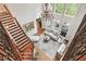 Two-story living room with hardwood floors and a chandelier at 2214 Taylor Grady Ter, Duluth, GA 30097