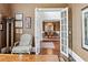 Spacious home office with built-in shelving and view into formal dining room at 2214 Taylor Grady Ter, Duluth, GA 30097