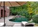 Relaxing pool with spa and patio furniture at 2214 Taylor Grady Ter, Duluth, GA 30097