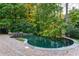 Curved pool and spa with flagstone decking at 2214 Taylor Grady Ter, Duluth, GA 30097