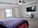 Spacious bedroom with large TV and seating at 2338 Newbury Oaks Dr, Lawrenceville, GA 30044