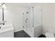 Bathroom with walk-in shower, toilet and double vanity at 351 Willowwind Dr, Loganville, GA 30052