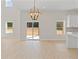 Spacious dining room with hardwood floors and sliding glass doors at 351 Willowwind Dr, Loganville, GA 30052