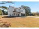 Two-story house with white siding, dark trim, and a two-car garage at 351 Willowwind Dr, Loganville, GA 30052