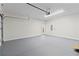 Spacious garage with epoxy floor and ample storage at 351 Willowwind Dr, Loganville, GA 30052