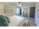 Well-lit bedroom featuring a comfortable queen bed and access to a bathroom at 1933 Matthew Way, Lithonia, GA 30058