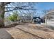 Gravel front yard with mature tree and view of neighboring homes at 249 Josephine Ne St, Atlanta, GA 30307