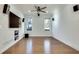 Spacious living room with hardwood floors and built-in entertainment center at 249 Josephine Ne St, Atlanta, GA 30307