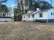 Ranch home with a large yard and detached shed at 574 Pool Rd, Hiram, GA 30141