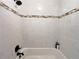 Clean bathroom with a shower/tub combo and tiled walls at 6520 Roswell Rd # 3, Atlanta, GA 30328