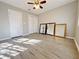 Charming bedroom with wood-look floors and plenty of natural light at 6520 Roswell Rd # 3, Atlanta, GA 30328