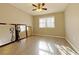 Spacious bedroom with wood-look floors and large windows at 6520 Roswell Rd # 3, Atlanta, GA 30328