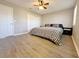Bright bedroom featuring wood-look floors and ample closet space at 6520 Roswell Rd # 3, Atlanta, GA 30328