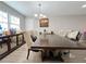 Elegant dining room with a long table and comfortable seating at 6520 Roswell Rd # 3, Atlanta, GA 30328