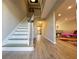 Two-story entryway with hardwood floors and staircase at 6520 Roswell Rd # 3, Atlanta, GA 30328