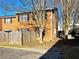 Brick townhouse with wooden fence and landscaping at 6520 Roswell Rd # 3, Atlanta, GA 30328