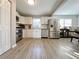 Modern kitchen with stainless steel appliances and white cabinets at 6520 Roswell Rd # 3, Atlanta, GA 30328