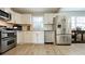 Modern kitchen with stainless steel appliances and white cabinets at 6520 Roswell Rd # 3, Atlanta, GA 30328