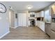 Modern kitchen with stainless steel appliances and white cabinets at 6520 Roswell Rd # 3, Atlanta, GA 30328