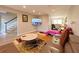 Living Room with sectional sofa, chaise lounge and large TV at 6520 Roswell Rd # 3, Atlanta, GA 30328