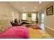 Bright living room with comfortable seating and large windows at 6520 Roswell Rd # 3, Atlanta, GA 30328
