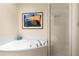 Bathroom with corner bathtub and walk-in shower at 123 Luckie Nw St # 2210, Atlanta, GA 30303