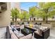 Relaxing courtyard with sectional sofa and shade trees at 123 Luckie Nw St # 2210, Atlanta, GA 30303