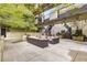 Courtyard with sectional seating and shade trees at 123 Luckie Nw St # 2210, Atlanta, GA 30303