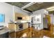 Modern kitchen with stainless steel appliances and light wood cabinets at 123 Luckie Nw St # 2210, Atlanta, GA 30303