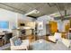 Open living area with contemporary furniture and polished concrete floors at 123 Luckie Nw St # 2210, Atlanta, GA 30303